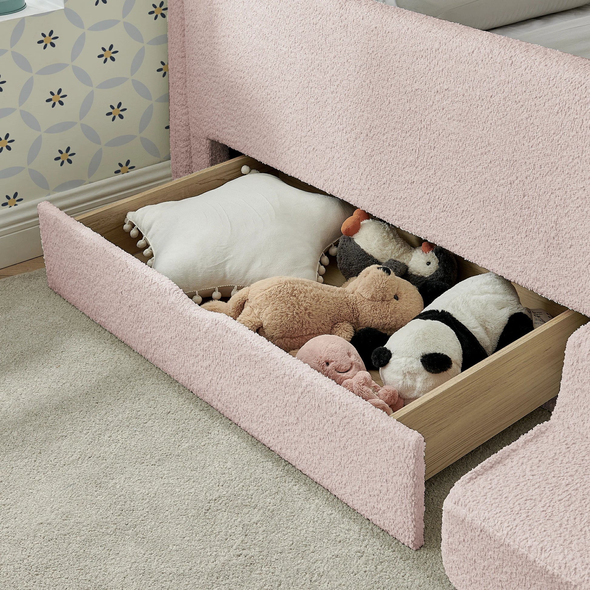 Largebuilt-indrawerofferspracticalstoragefortoys_pillows_andessentials_helpingkeepkids_roomsneatandorganized.