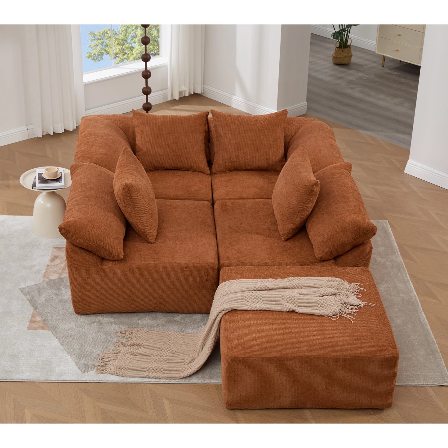Topviewofrustchenillemodularsectionalsofawithottomaninacompactloungesetup