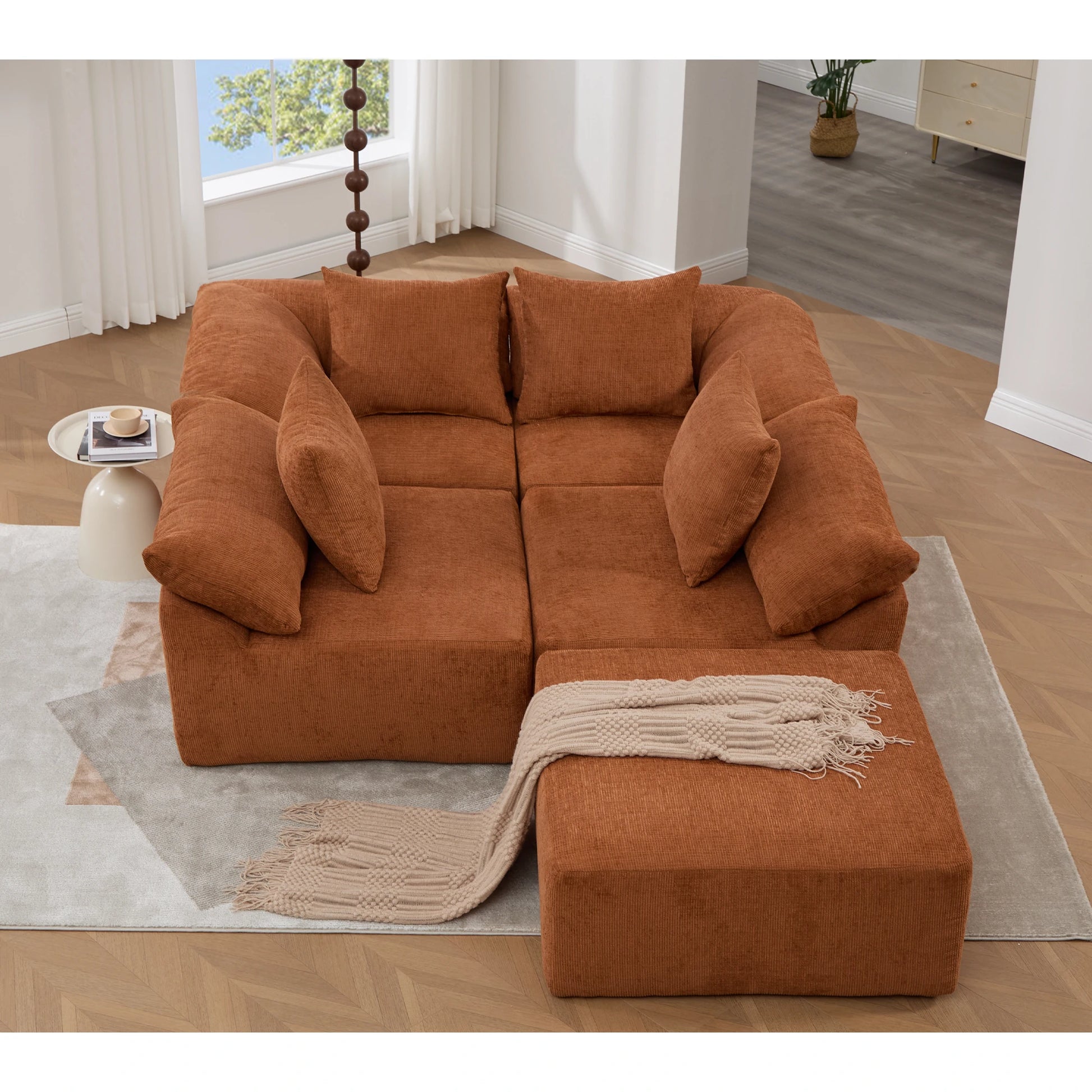 Topviewofrustchenillemodularsectionalsofawithottomaninacompactloungesetup