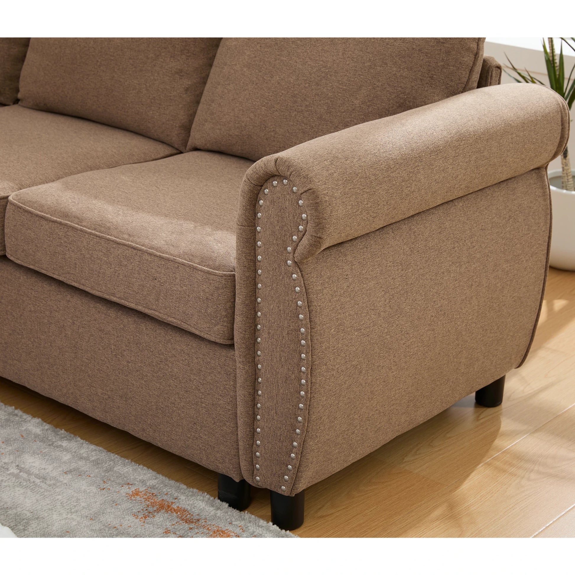 brown-sectional-sofa-rolled-arm-nailhead-detail