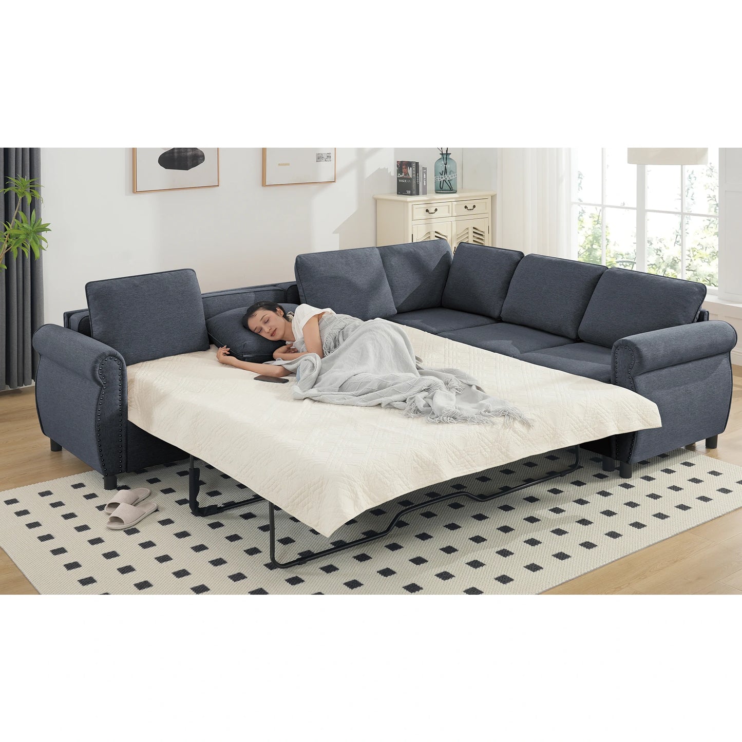 dark-blue-sectional-sleeper-sofa-bed-sleeping-scene
